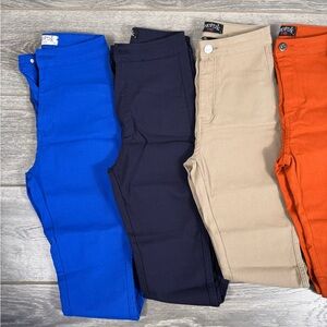 Swank A Posh pants. Light grey, royal blue, navy blue, burnt orange and khaki.